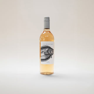 rose wine bottle with a fish illustration on a white background
