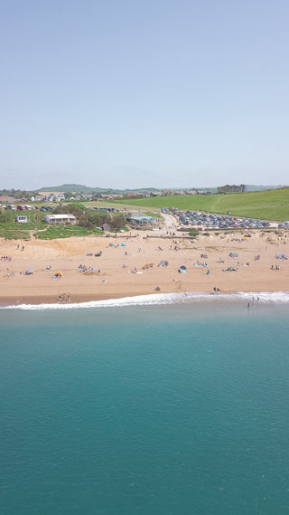 drone view of hive beach and hive beach cafe